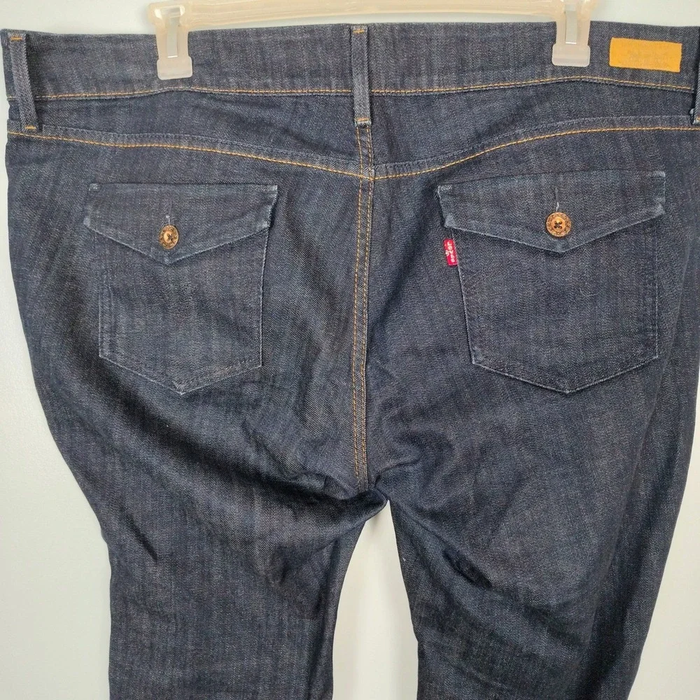 Levis 542 Flare Jeans Women 22M Dark Wash Blue Denim Distressed Hem Mid Rise y2k